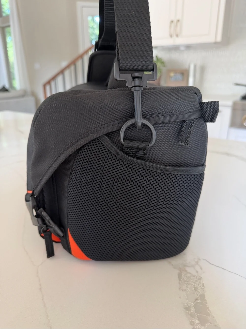 Sony Black Compact Messenger Camera Bag with Red Accent